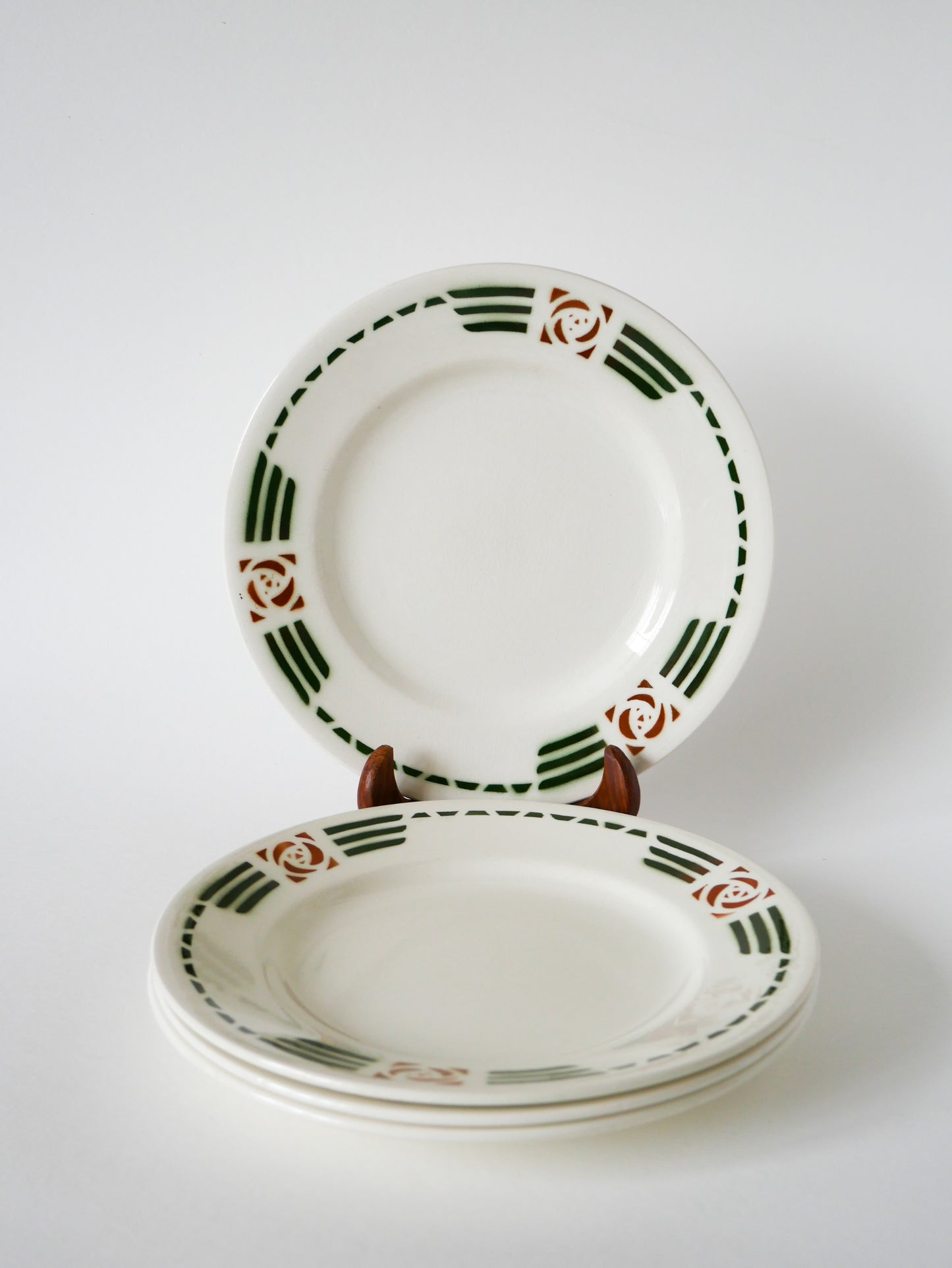 Lot de 4 assiettes plates Salins, E. Charbonnier, modèle "Courbet", 1930