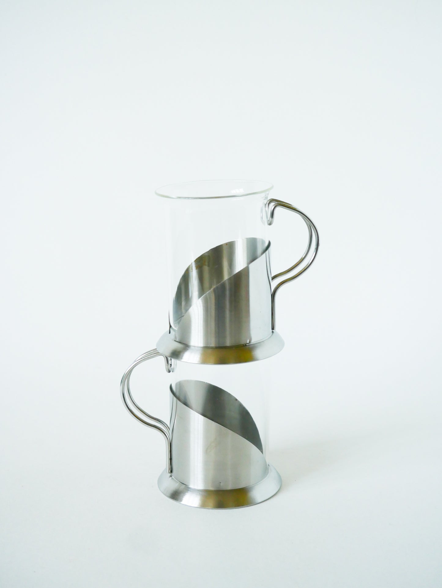 Paire de tasses à thé en verre et inox, Design, 1980
