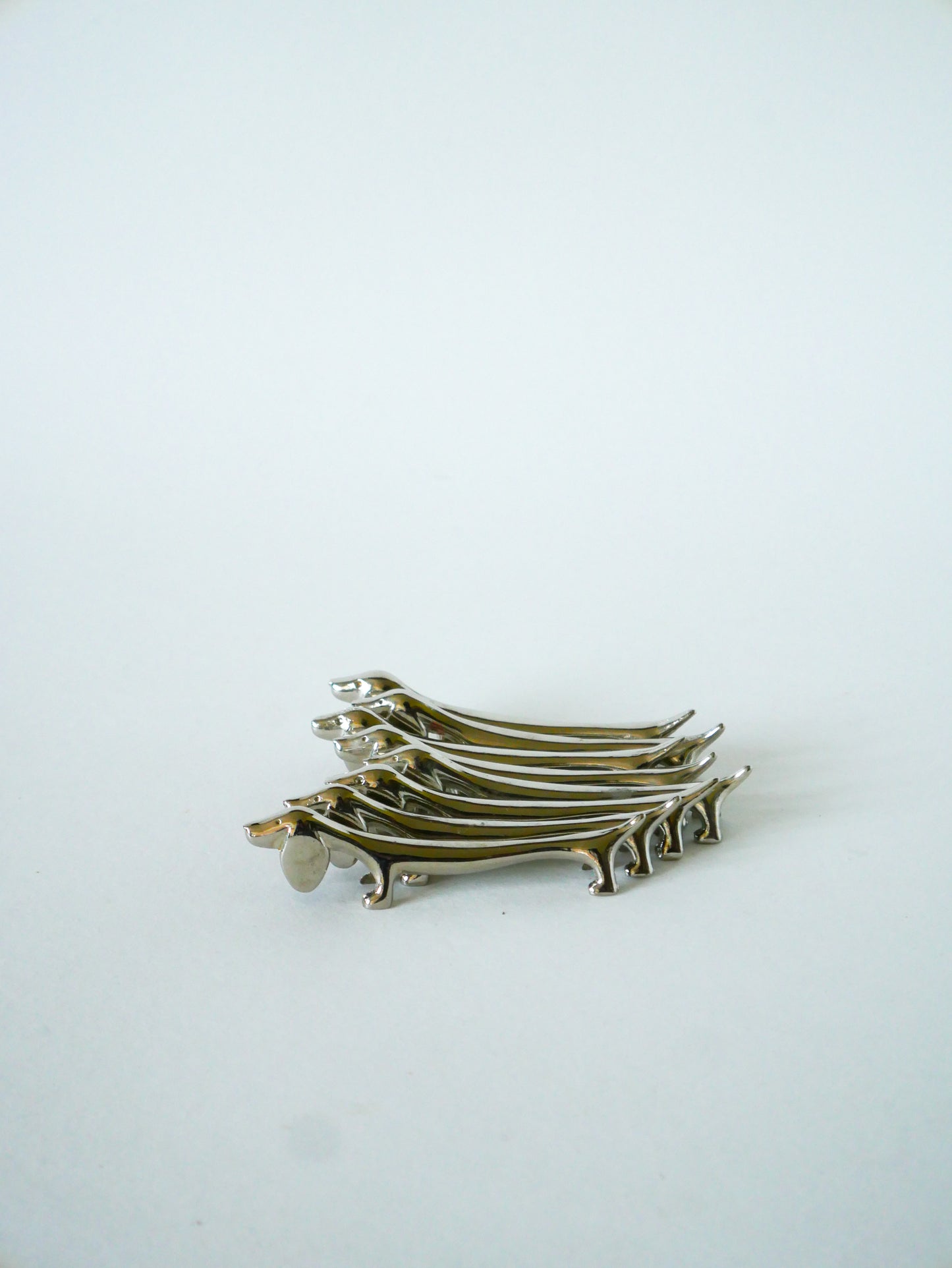 Lot de 8 porte-couteaux Teckel en métal argenté, Design, 1970