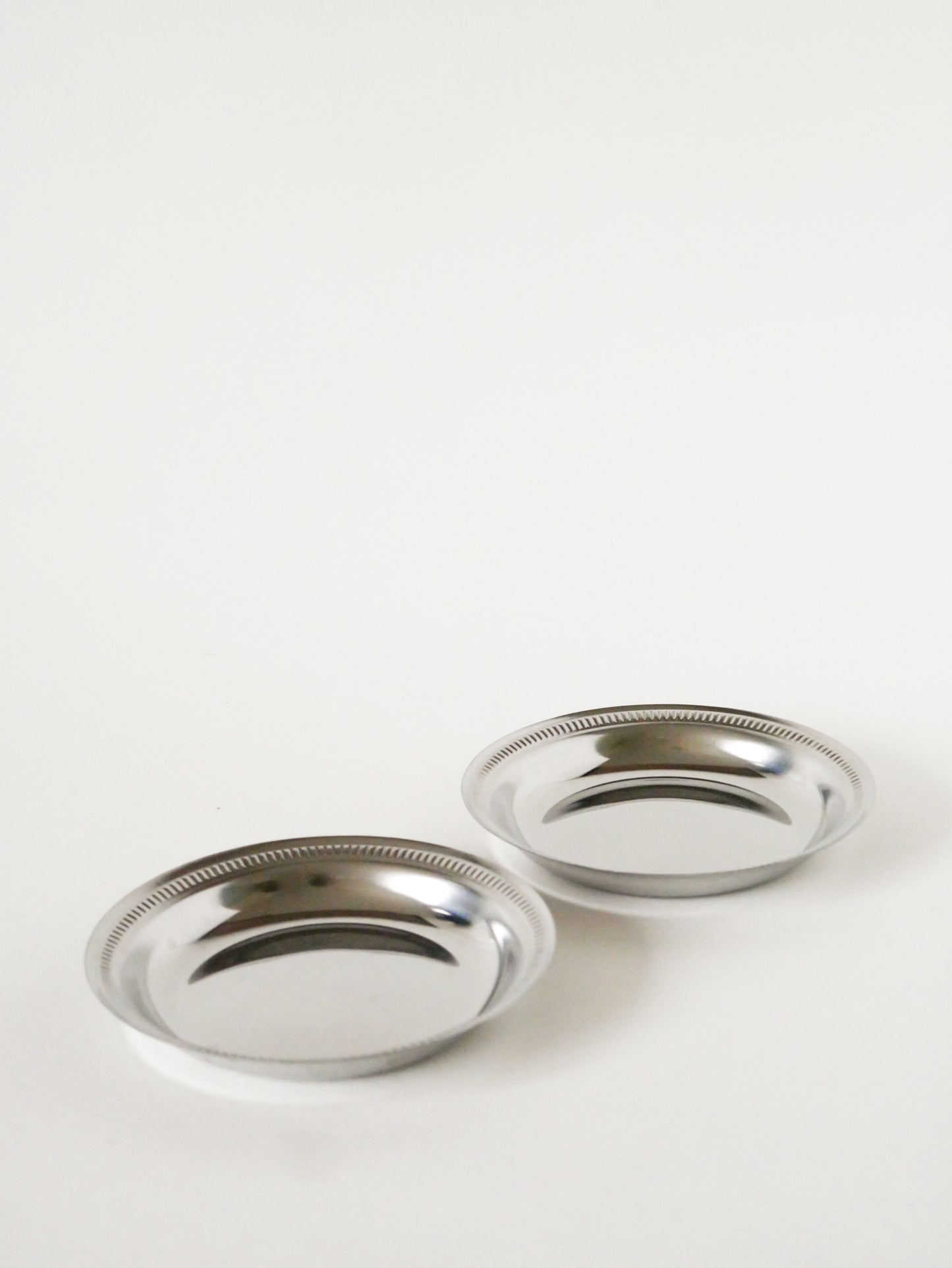 Paire de dessous de bouteilles en inox, Design, 1970