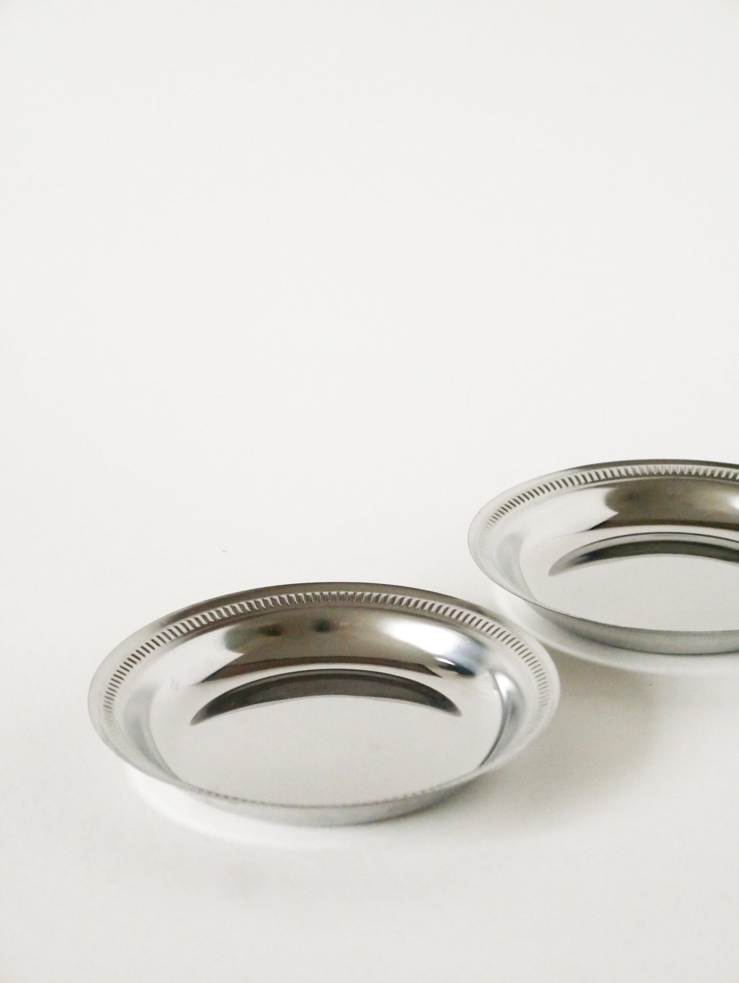 Paire de dessous de bouteilles en inox, Design, 1970