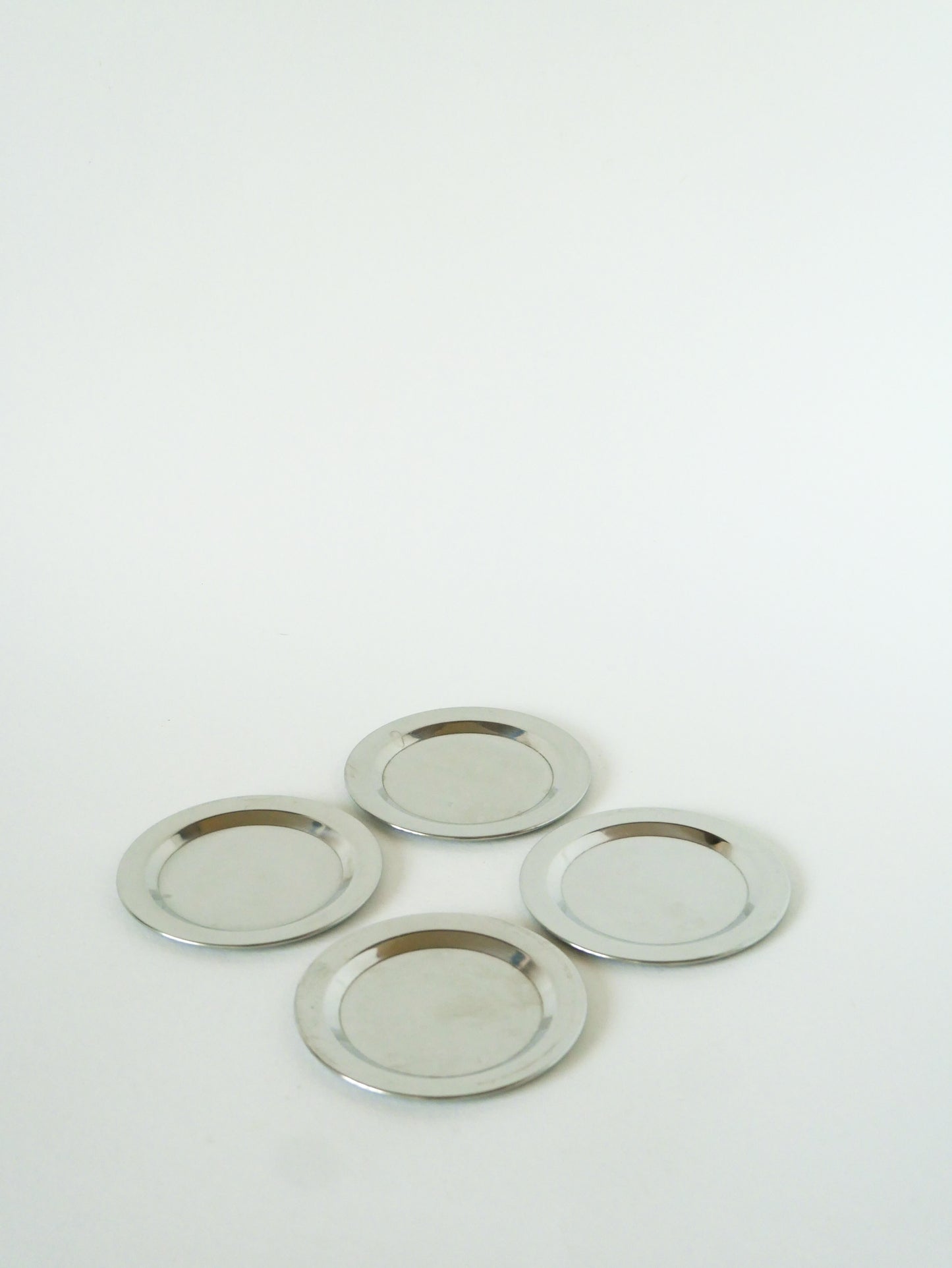Ensemble de 4 dessous de verres en inox, Design, 1970