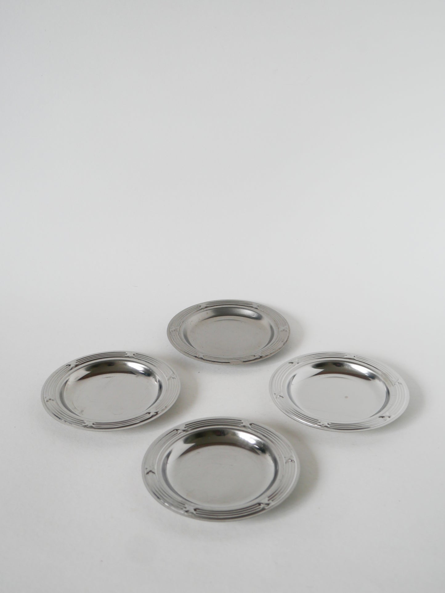 Lot de 4 dessous de verres en inox, Design, 1970 - 11.5 cm