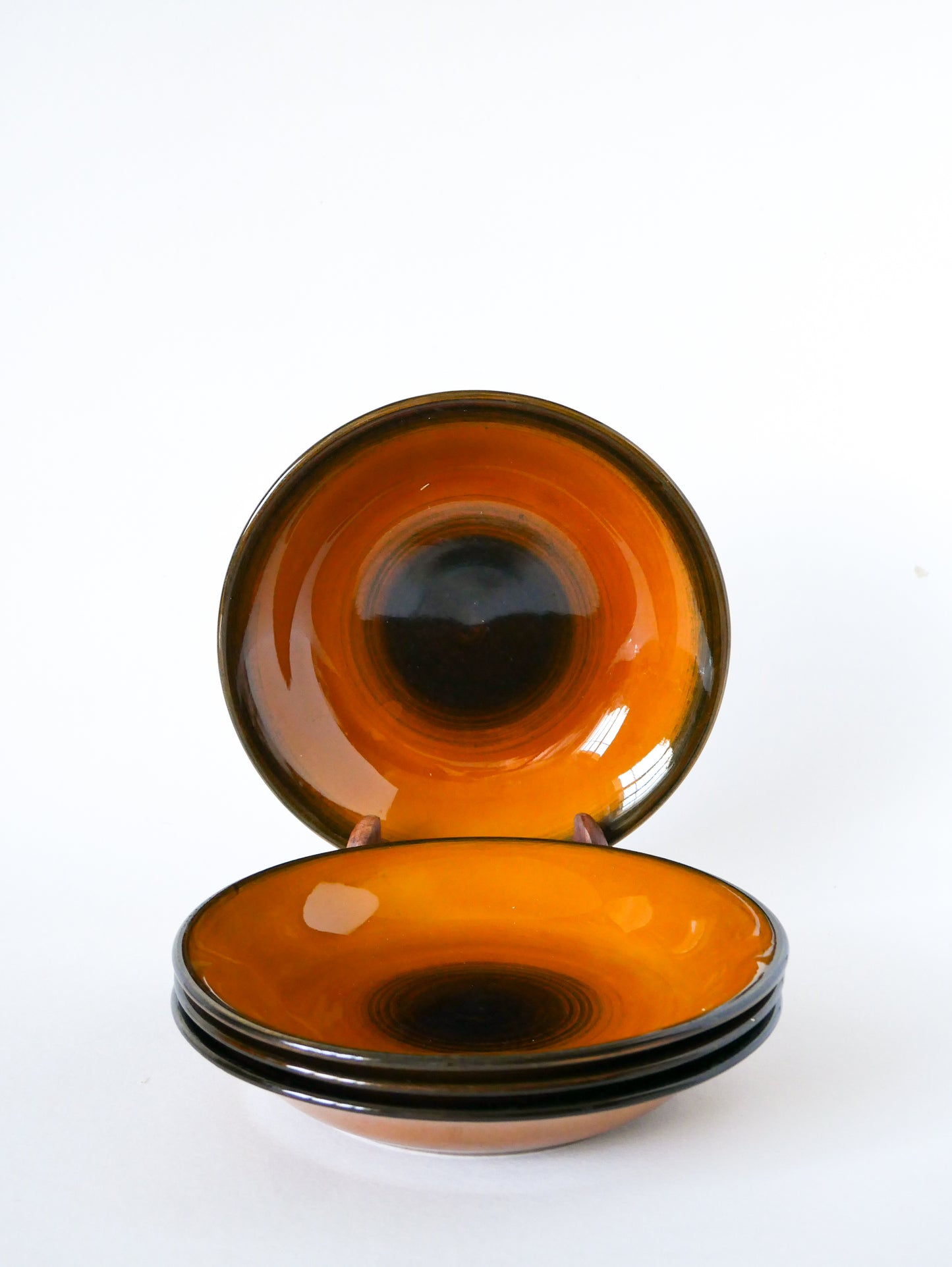 Lot de 4 assiettes creuses en céramique émailée, Longchamp, 1960