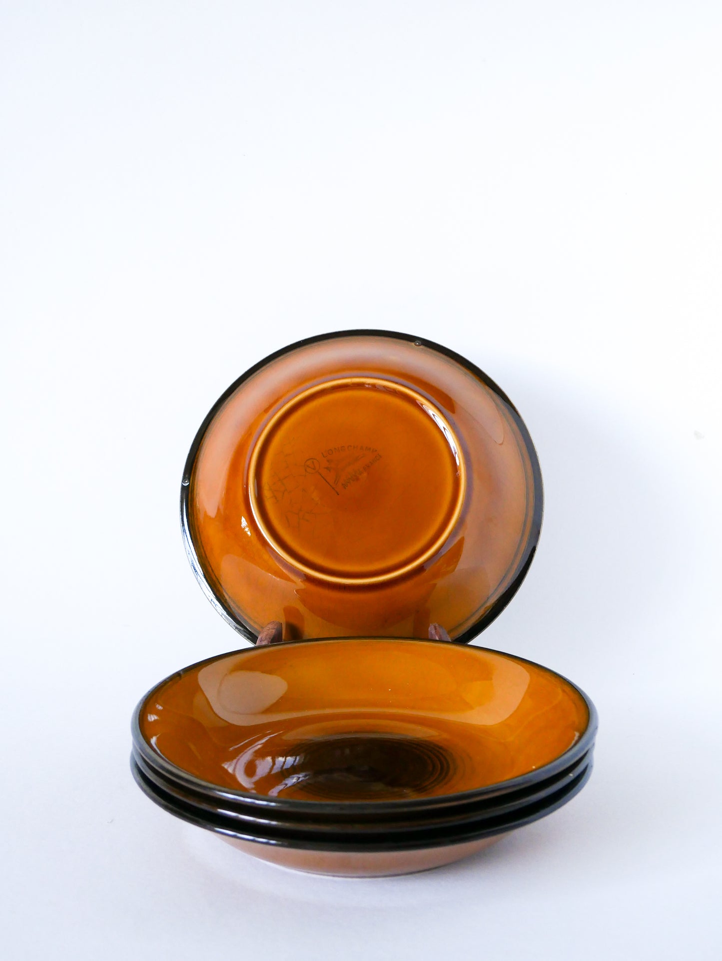Lot de 4 assiettes creuses en céramique émailée, Longchamp, 1960