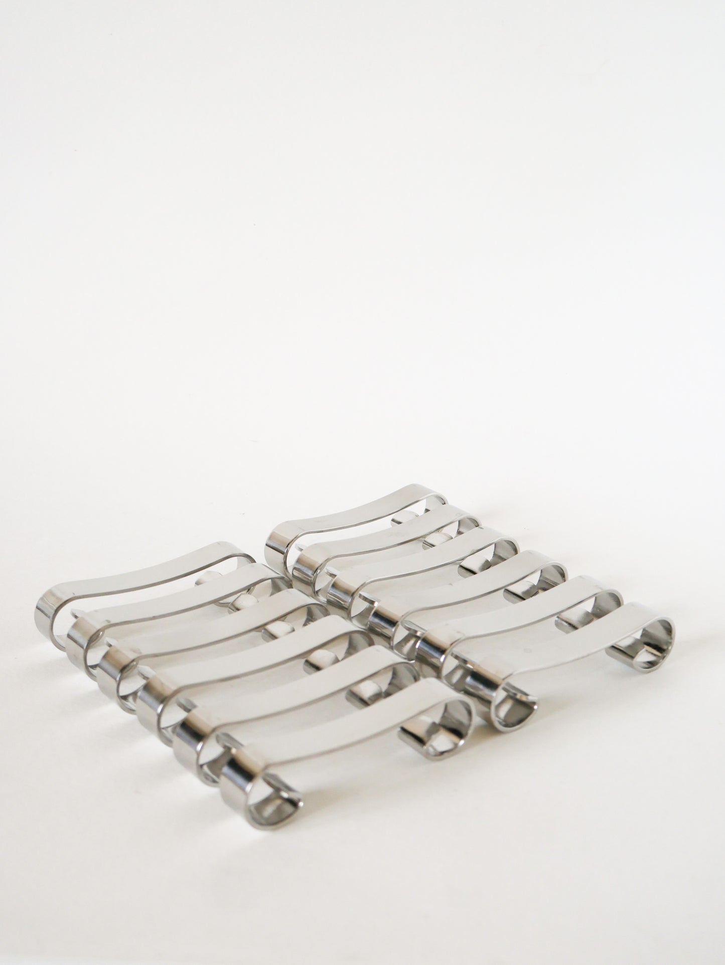 Ensemble de 12 porte-couteaux en inox, Design, 1970