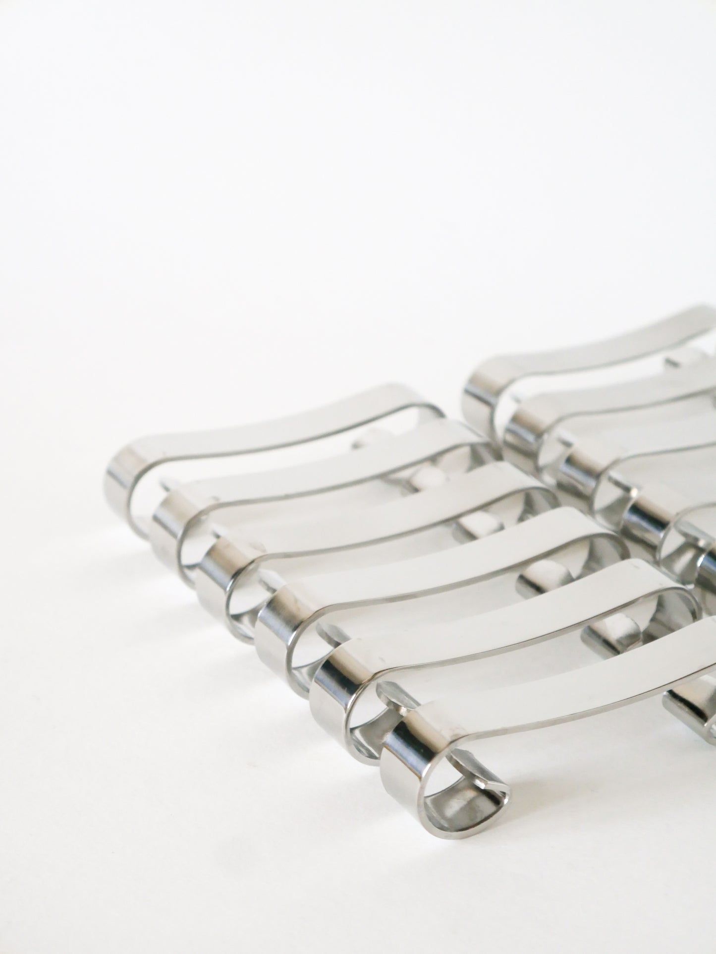Ensemble de 12 porte-couteaux en inox, Design, 1970