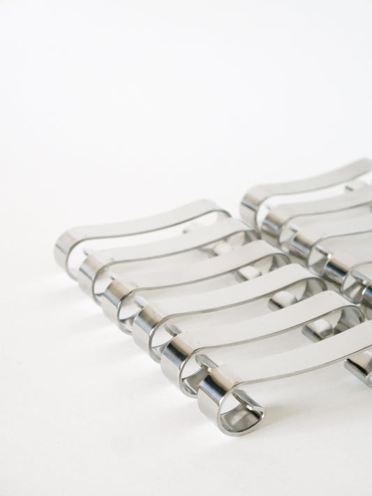 Ensemble de 12 porte-couteaux en inox, Design, 1970