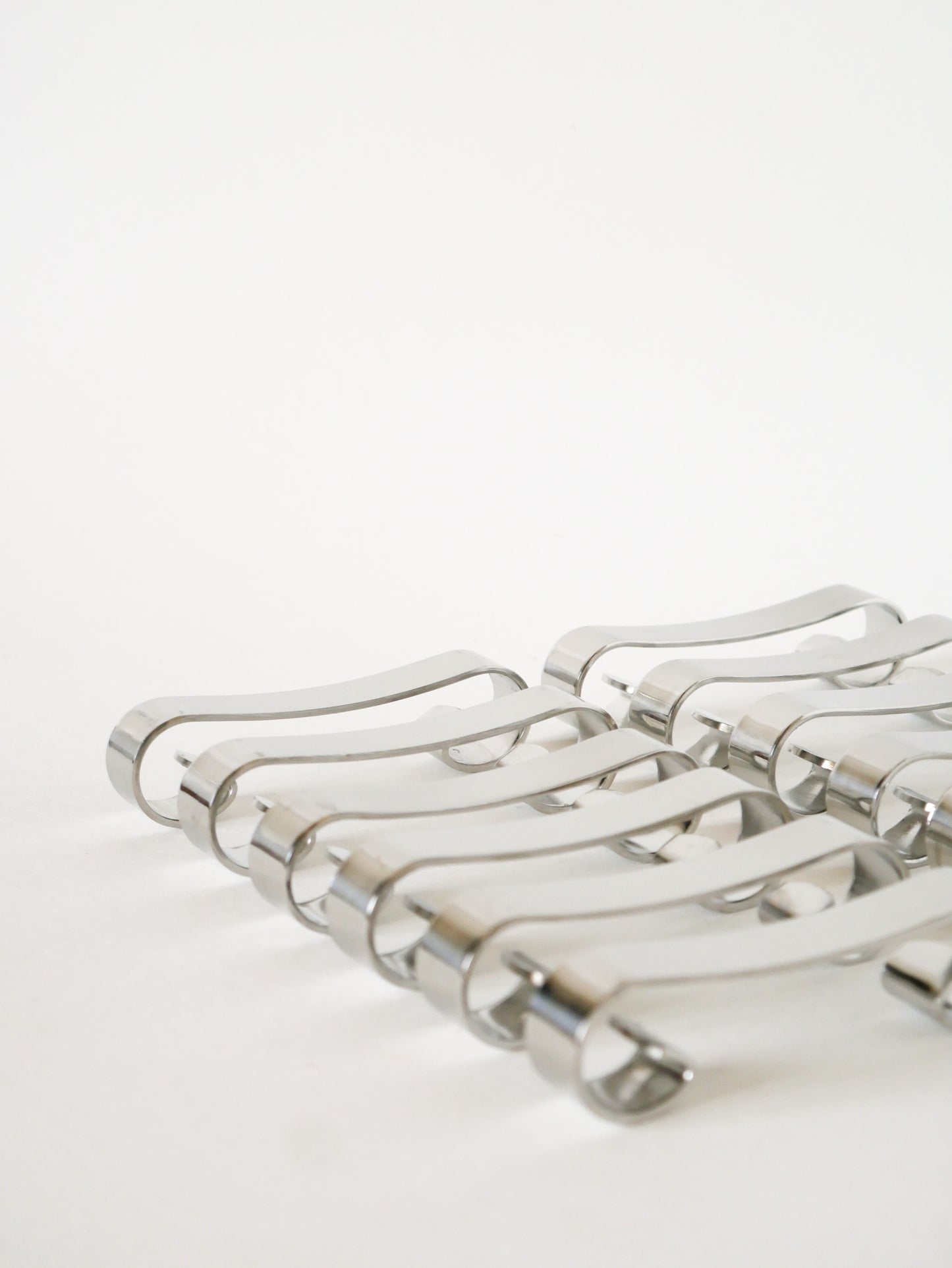 Ensemble de 12 porte-couteaux en inox, Design, 1970