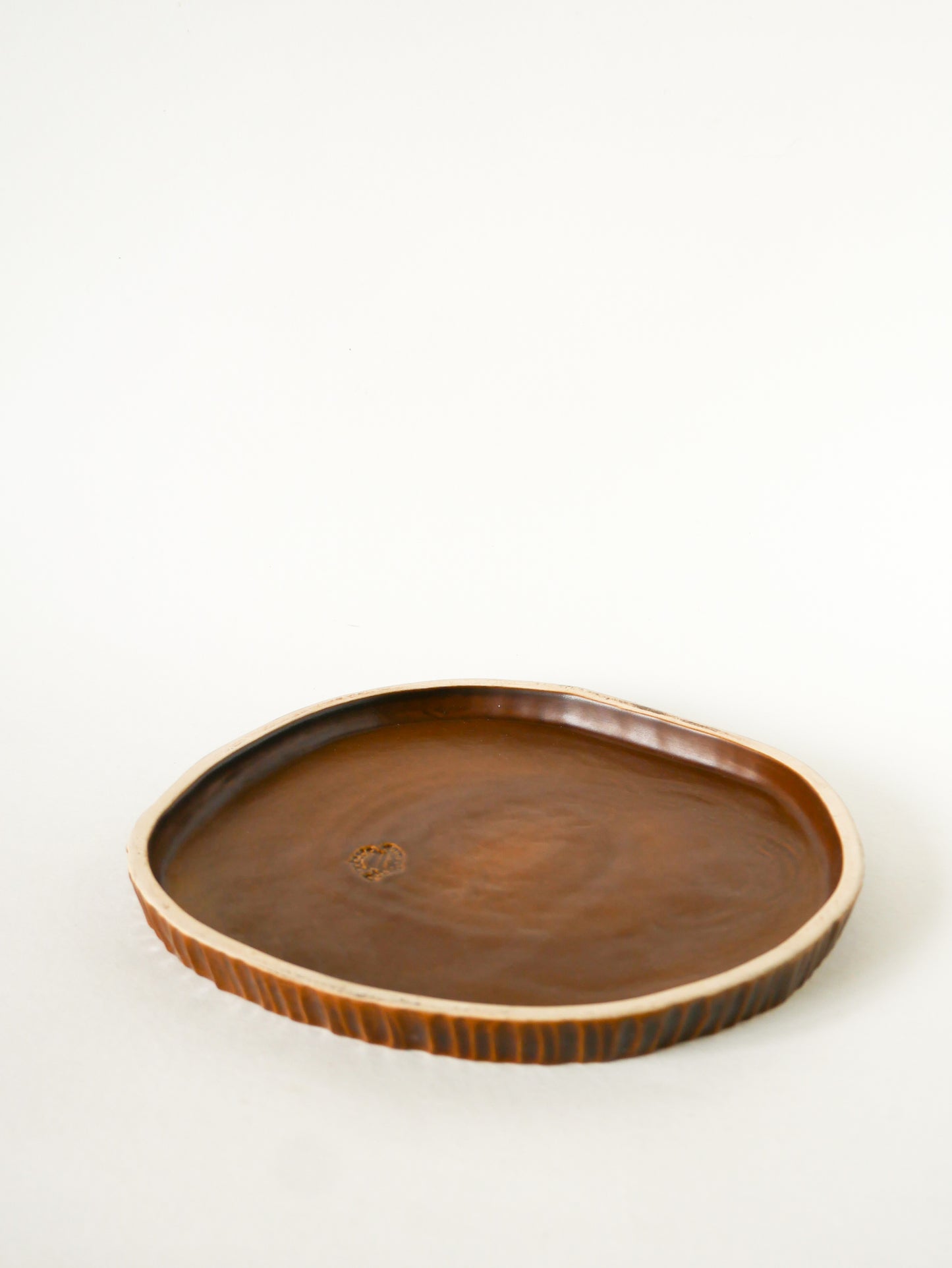 Dessous de plat en barbotine, forme Tronc, Poterie du Périgord, 1970