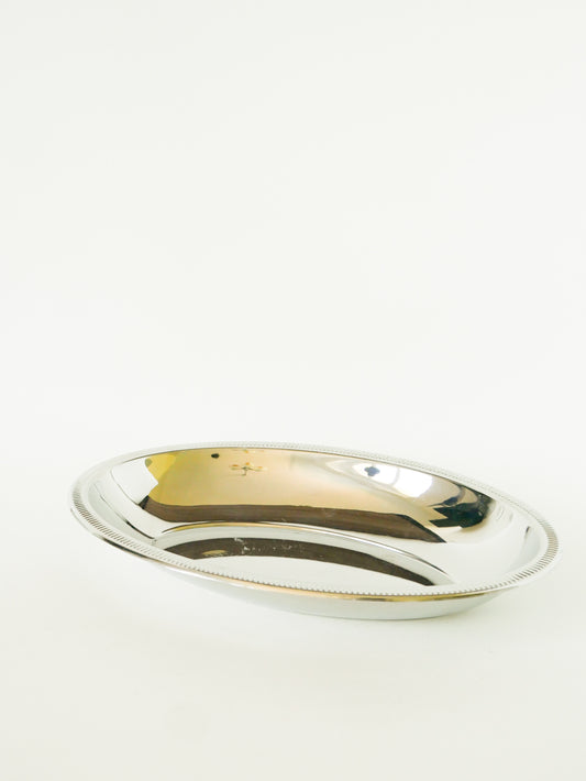 Grand plat oval en inox, signé Jean Couzon, 1970